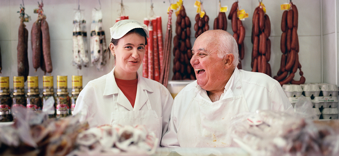 Family butchers smiling
