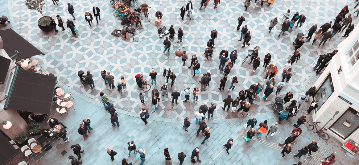 An aerial view of people in a city centre An aerial view of people in a city centre