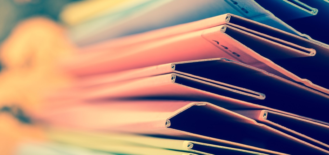 photo of a stack of paper files