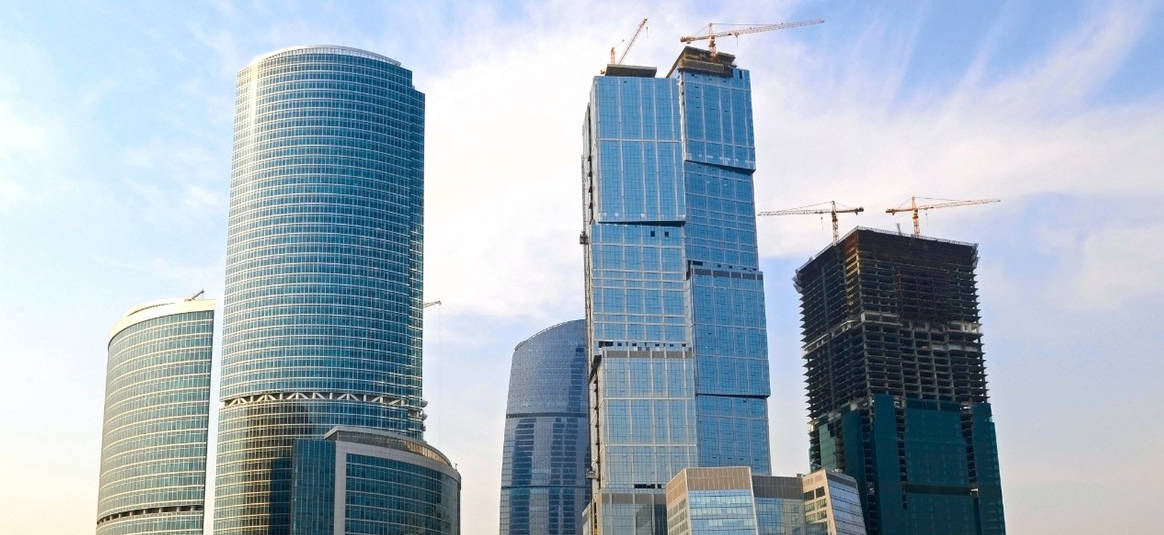 High rise buildngs with blue sky backdrop