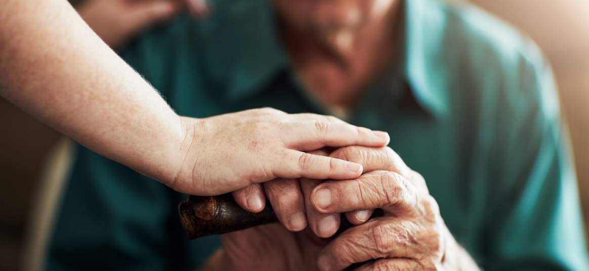 Photo of hands in a care home