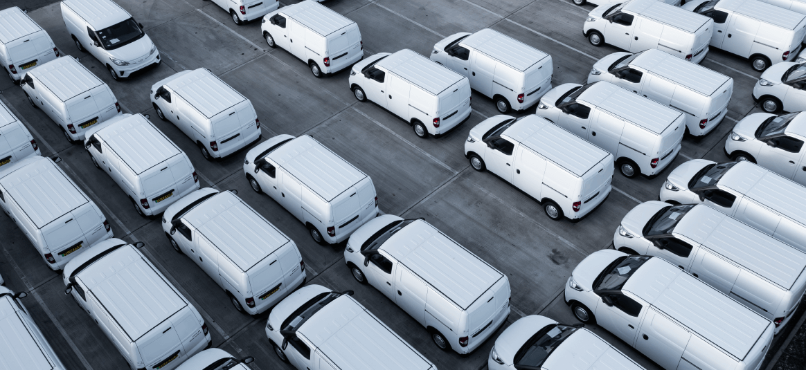 A fleet of white electric vans