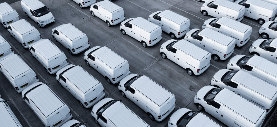 A fleet of white electric vans