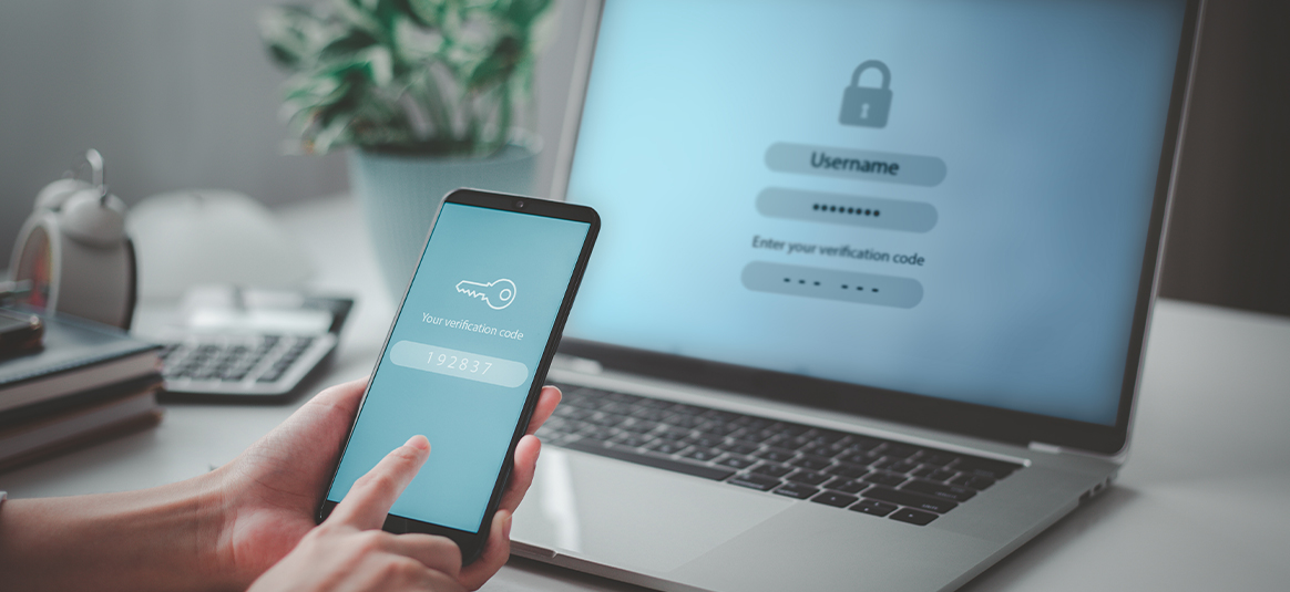 Mobile phone and laptop sharing a verification code