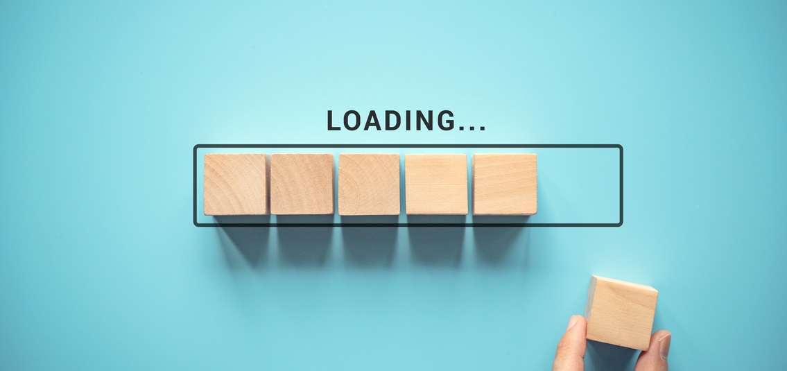 photo of a sequence of wooden blocks, representing software loading bar